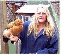 Owner of Oasis Montana, Chris Daum finds time every day to enjoy her chickens.